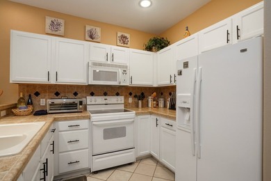 This Inviting, lakefront 2-bedroom 2-bath Villa is conveniently - photo 13