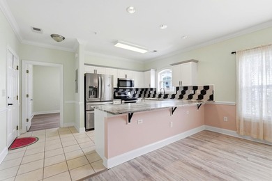 Welcome to this updated 3-bedroom, 2-bath end-unit condo in The - photo 15