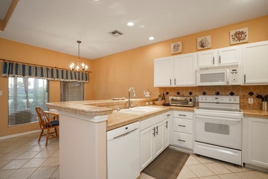 This Inviting, lakefront 2-bedroom 2-bath Villa is conveniently - photo 16