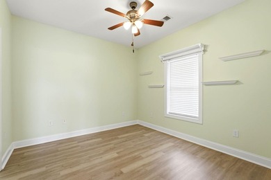 Welcome to this updated 3-bedroom, 2-bath end-unit condo in The - photo 18