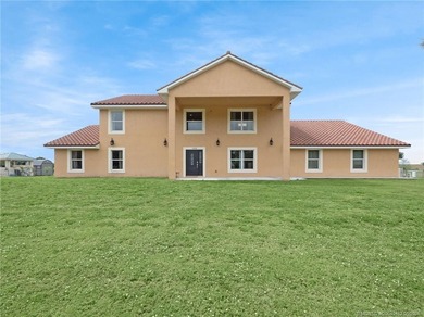 Welcome to this stunning waterfront home located on a rim canal - photo 2