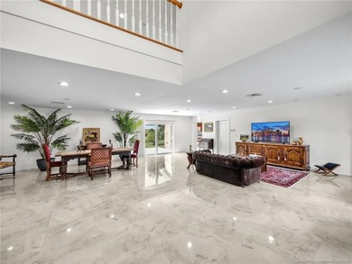 Welcome to this stunning waterfront home located on a rim canal - photo 4