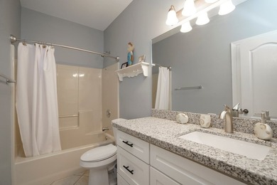 This Inviting, lakefront 2-bedroom 2-bath Villa is conveniently - photo 24