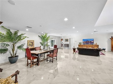 Welcome to this stunning waterfront home located on a rim canal - photo 5
