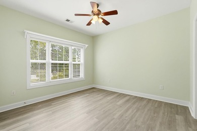 Welcome to this updated 3-bedroom, 2-bath end-unit condo in The - photo 26