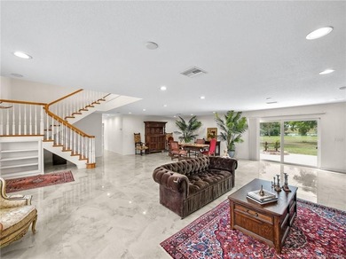 Welcome to this stunning waterfront home located on a rim canal - photo 6