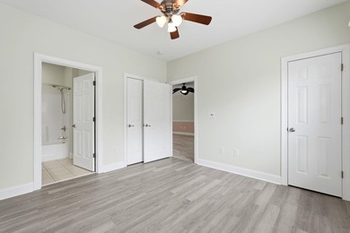 Welcome to this updated 3-bedroom, 2-bath end-unit condo in The - photo 27