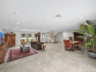 Welcome to this stunning waterfront home located on a rim canal - photo 7