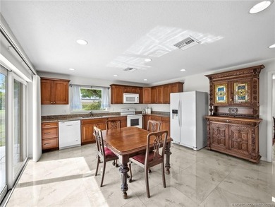 Welcome to this stunning waterfront home located on a rim canal - photo 8