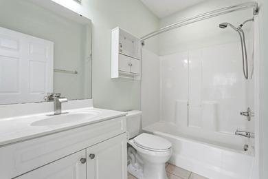 Welcome to this updated 3-bedroom, 2-bath end-unit condo in The - photo 29