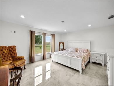 Welcome to this stunning waterfront home located on a rim canal - photo 10