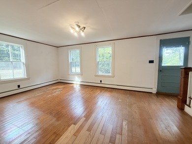 Located just outside the heart of Stonington, this spacious