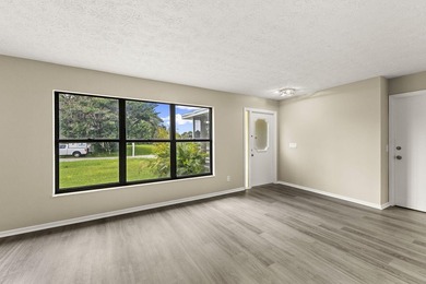 This beautifully remodeled pool home on an over sized lot is - photo 5
