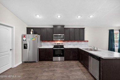 Beautifully maintained 4-bedroom, 2-bathroom home built in 2022 - photo 7