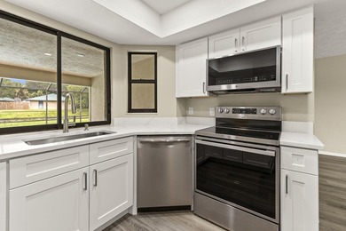 This beautifully remodeled pool home on an over sized lot is - photo 9