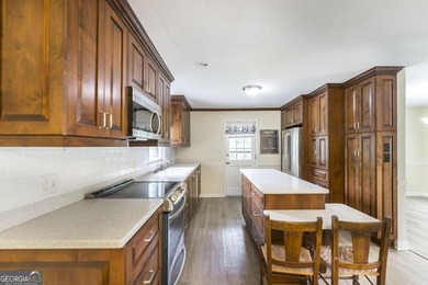 This move-in-ready, single-story 3-bedroom, 1.5-bathroom brick - photo 11