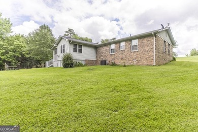 This move-in-ready, single-story 3-bedroom, 1.5-bathroom brick - photo 25