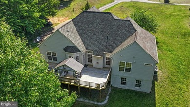 (See Aerial View Video) Nestled on 3 private acres with its own - photo 1