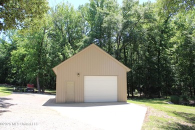 Lovely one-level home situated on a gated 4.8-acre lot in the - photo 3