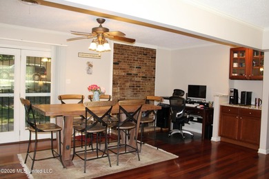 Lovely one-level home situated on a gated 4.8-acre lot in the - photo 8