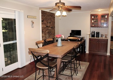 Lovely one-level home situated on a gated 4.8-acre lot in the - photo 9