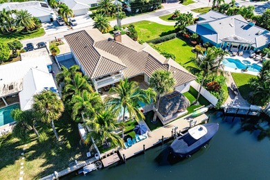Experience elevated waterfront living in this totally remodeled - photo 1