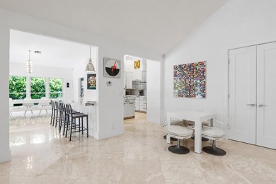 This exceptional and fully renovated one-story 5-bedroom, 5-bath - photo 7