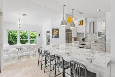 This exceptional and fully renovated one-story 5-bedroom, 5-bath - photo 8