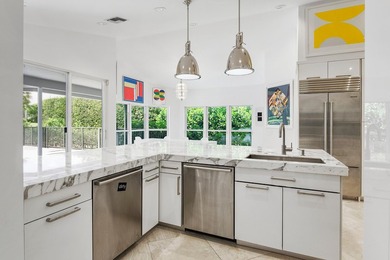This exceptional and fully renovated one-story 5-bedroom, 5-bath - photo 9