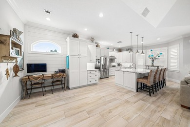 Experience elevated waterfront living in this totally remodeled - photo 9