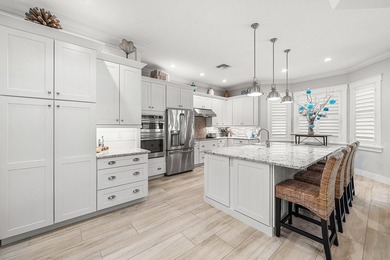 Experience elevated waterfront living in this totally remodeled - photo 10