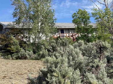 Lake Home For Sale in West Magic, Idaho