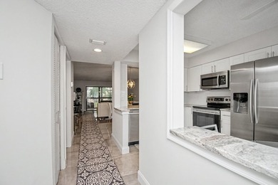 Renovated with timeless style, this beautifully appointed 2 - photo 7