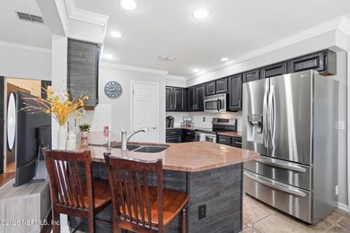 Step into a beautifully maintained home featuring soaring - photo 8
