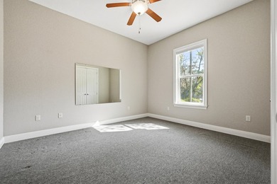 Custom-built home with flexible living space, oversized 3-car - photo 12