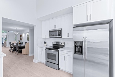 Explore an exceptional 3-bedroom plus den/bonus room, 4.5-bath - photo 12