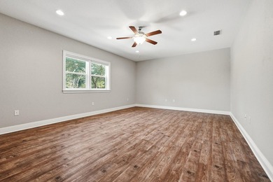 Custom-built home with flexible living space, oversized 3-car - photo 14
