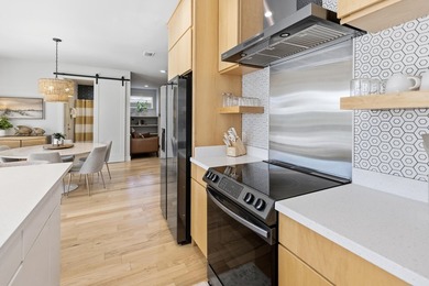 Welcome to 213 Pinetree Drive, a fully furnished contemporary - photo 16