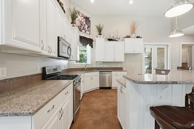 Custom-built home with flexible living space, oversized 3-car - photo 27