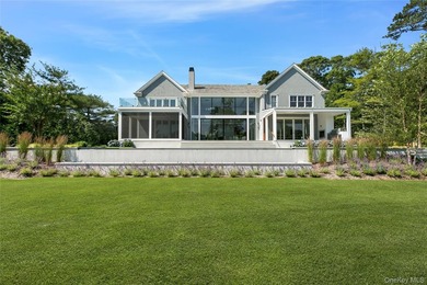 Positioned on a prime stretch of waterfront in Quogue, this - photo 35