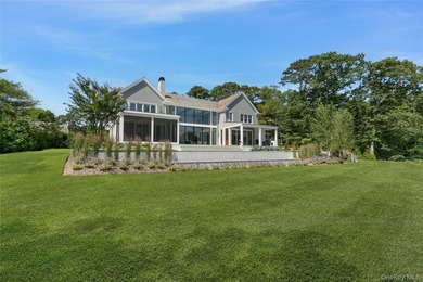 Positioned on a prime stretch of waterfront in Quogue, this - photo 36