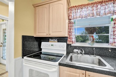 Welcome to this charming 1 Bedroom/1 Bathroom top-floor condo in - photo 6