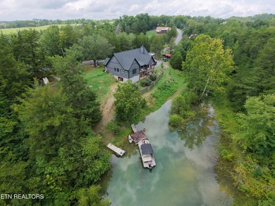 Welcome to 975 Lake Smoky Rd, a rare lakefront retreat with 2 - photo 2