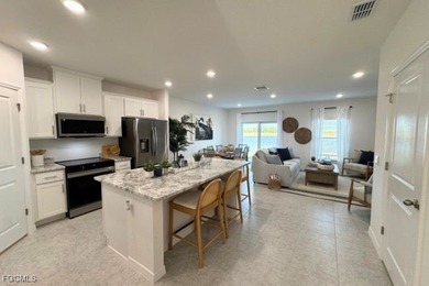 Set on a cul-de-sac with tranquil water-view pond vistas, this - photo 11