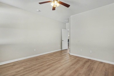 This well-designed three-bedroom, two-bathroom home features an - photo 14
