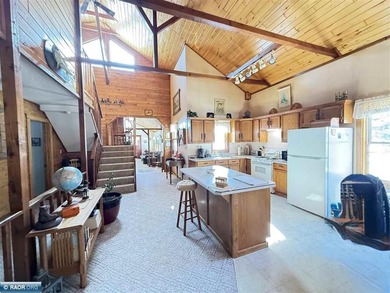Stunning Big MaCarthy lakefront home located just north of - photo 5