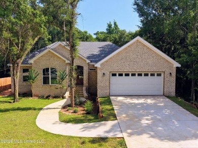 NEW CONSTRUCTION on Shaded Lot just moments from the Water! This - photo 1