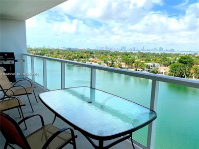 Wake up to breathtaking, unobstructed Intracoastal and Miami