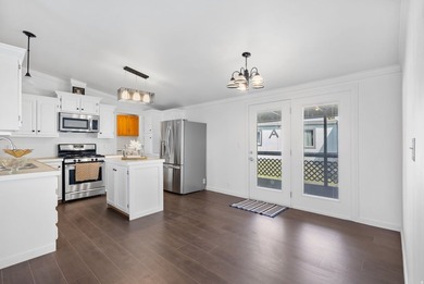 Step into this beautifully remodeled double-wide mobile home - photo 5