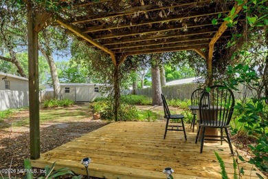 Perfectly positioned on a generous TRIPLE LOT along a quiet - photo 5